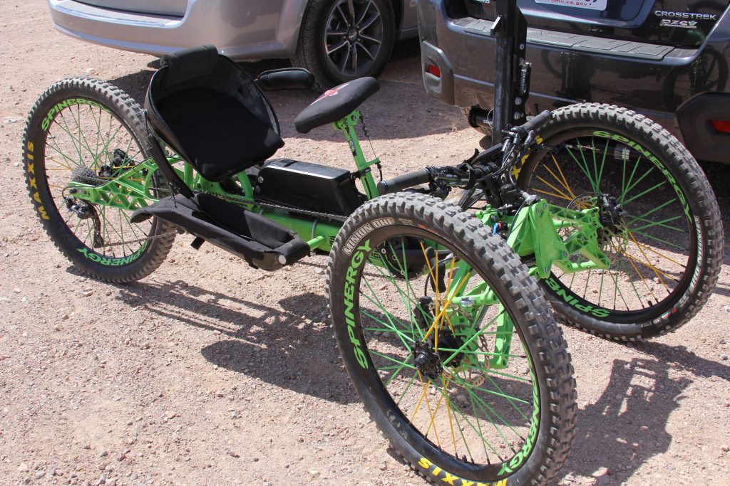 HERE'S ONE BADASS RIG. FULL SUSPENSION, DISC, HAND CRANK, AND E-BIKE CAPABLE. 