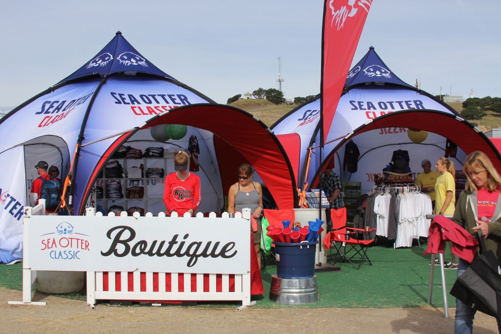 THE SEA OTTER MERCHANDISE BOOTHS WERE HOPPING WITH VISITORS GETTING THEIR COOL SEA OTTER SOUVENIRS  