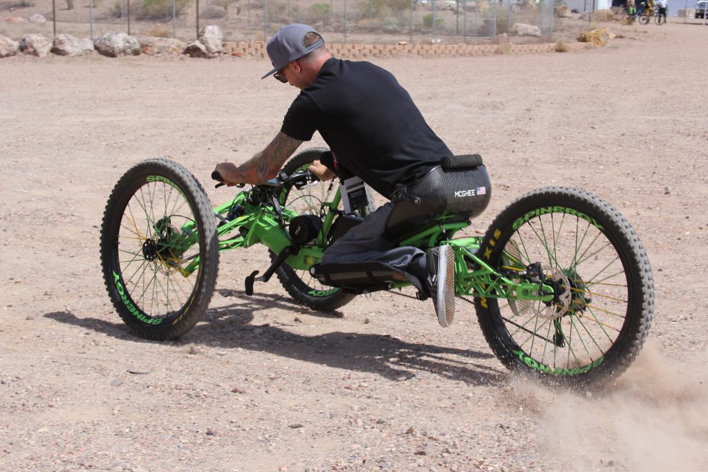 HAND CRANK, THE ELECTRIC PART IS PEDAL ASSIST, YOU STEER WITH YOUR CHEST VIA THE CHEST PAD, HOWEVER IF YOU WANT TO A THROTTLE LEVER CAN HELP WITH THE FUN.