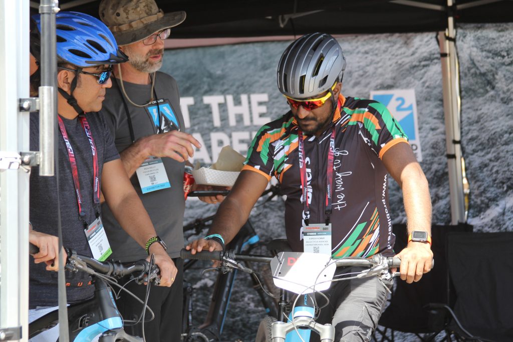 "OK THIS LITTLE BUTTON WILL HELP YOU PEDAL, THIS ONE IS FOR WHEELIES, THIS ONE IS FOR THE ROCKETS." "YES IT'S AN E-BIKE."