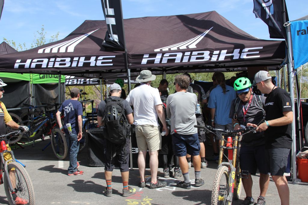 LONG LINES AT HAIBIKE DIDN'T DISCOURAGE ANYONE FROM WAITING. 