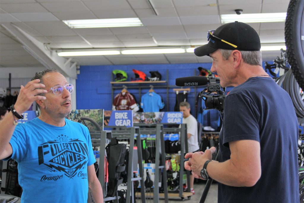 MIKE FRANZE TAKING TIME TO GIVE A LITTLE HISTORY ABOUT FULLERTON BICYCLE WITH GIANT